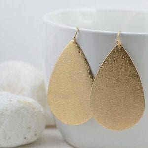 gold star dust teardrop earrings